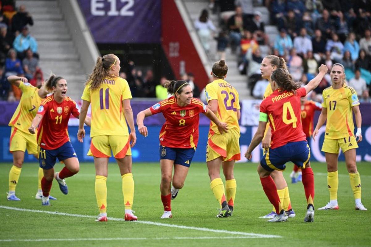Spain's midfielder #08 Mariona Caldentey (C) celebrates after scoring her team's fourth goal during the UEFA Women's Euro 2025 Group B football match between Spain and Belgium at the Arena Thun stadium in Thun on July 7, 2025. SEBASTIEN BOZON / AFP