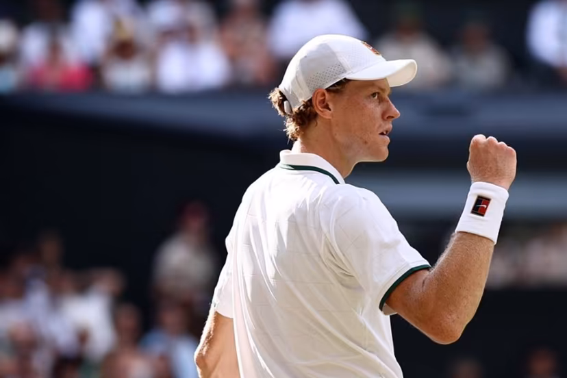 Italy's Jannik Sinner reacts against Serbia's Novak Djokovic during their men's singles semi-final tennis match on the twelfth day of the 2026 Wimbledon Championships at The All England Lawn Tennis and Croquet Club in Wimbledon, southwest London, on July 10, 2026. Henry Nicholls / AFP