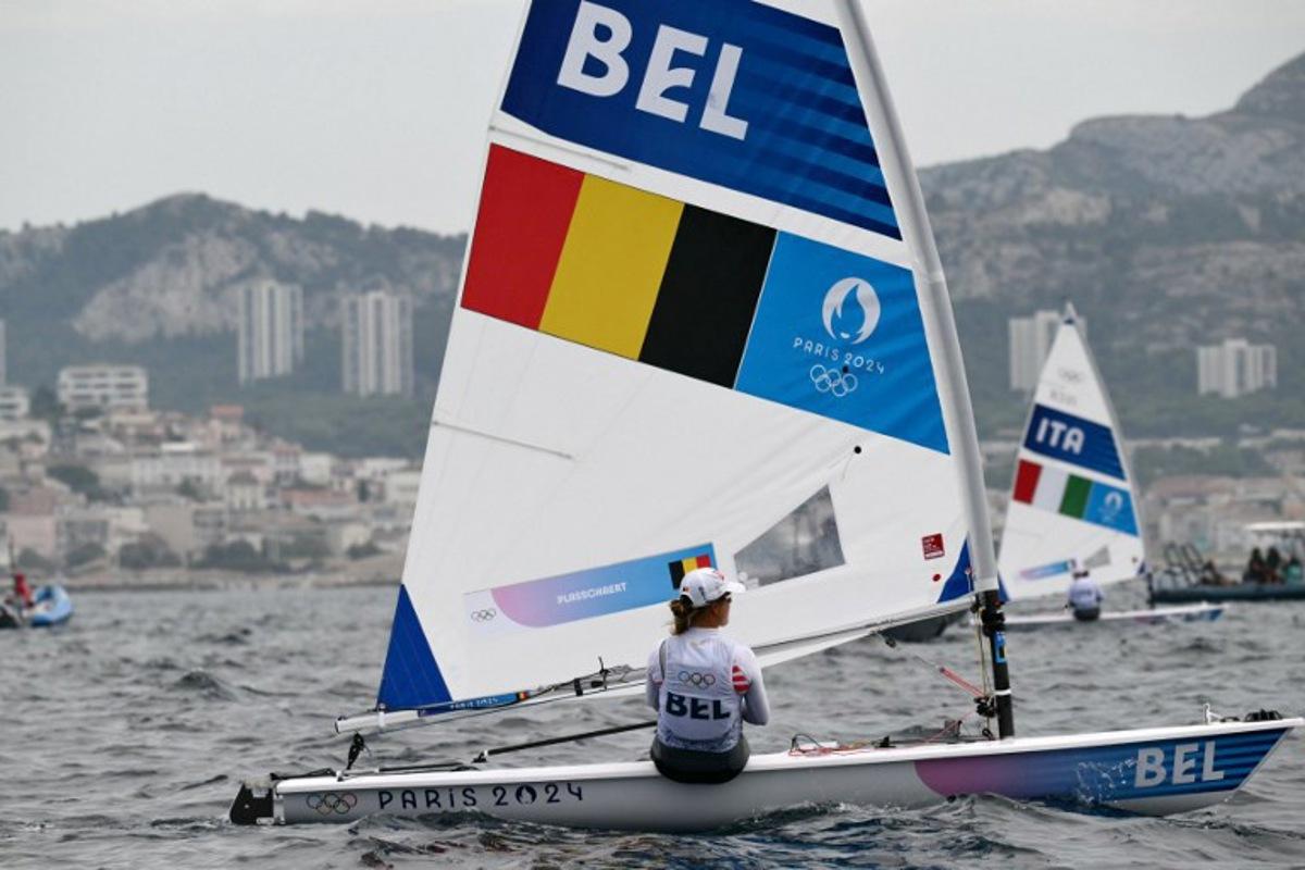 Belgium's Emma Plasschaert prepares for the medal race of the women's ILCA 6 single-handed dinghy event during the Paris 2024 Olympic Games sailing competition at the Roucas-Blanc Marina in Marseille on August 7, 2024. Christophe SIMON / AFP
