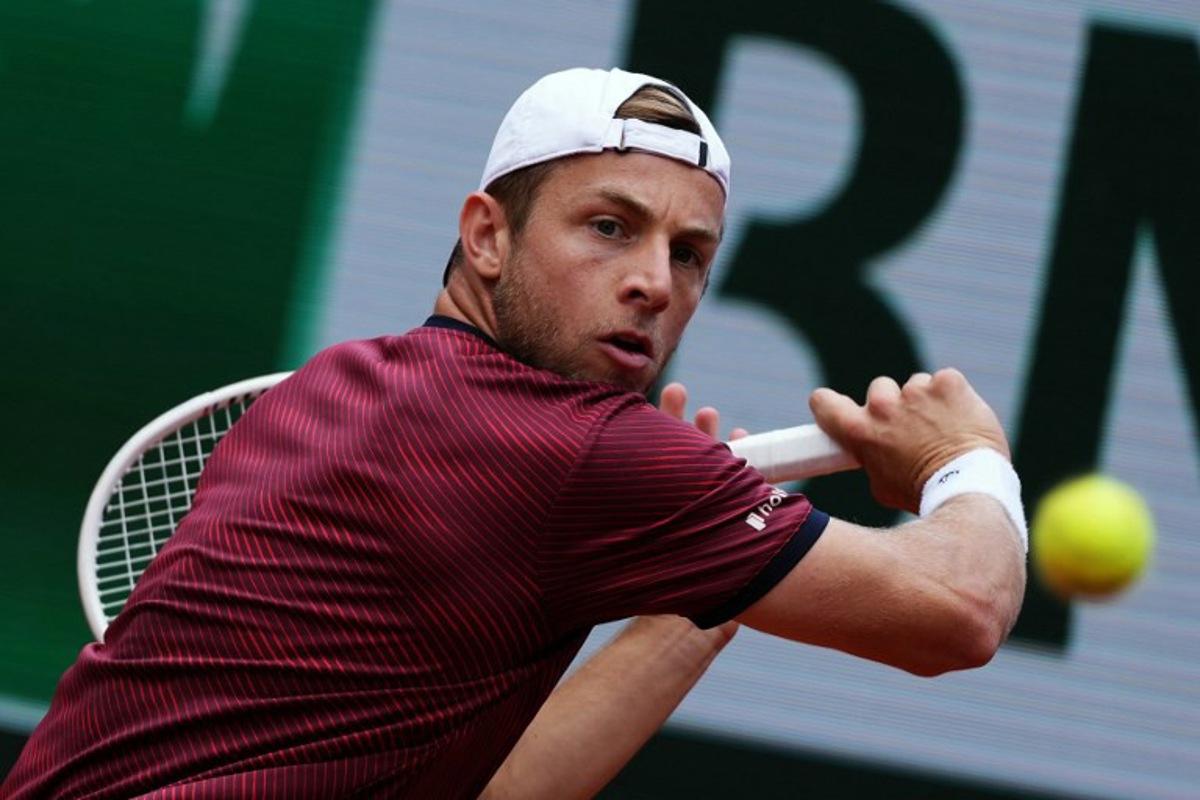 Netherlands' Tallon Griekspoor plays a backhand return to Germany's Alexander Zverev during their men's singles match on day 9 of the French Open tennis tournament on Court Suzanne-Lenglen at the Roland-Garros Complex in Paris on June 2, 2025. Dimitar DILKOFF / AFP