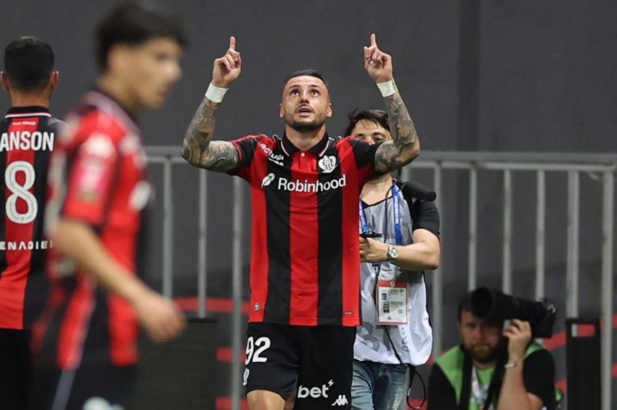 Nice's French defender #92 Jonathan Clauss celebrates after scoring a first goalduring the L1-L2 playoff second-leg football match between first divison club OGC Nice and second division club AS Saint-Etienne at the Allianz Riviera Stadium in Nice, south-eastern France, on May 29, 2026. Valery HACHE / AFP