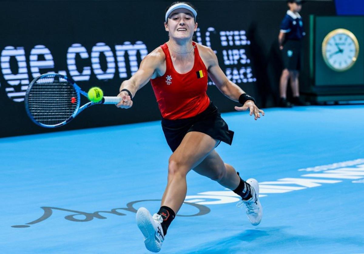 Belgium's Jana Otzipka hits a return to Ukraine's Anhelina Kalinina during their women's singles quarter-final match at the Billie Jean King Cup tennis tournament in Shenzhen, southern China's Guangdong province on September 24, 2026. CN-STR / AFP