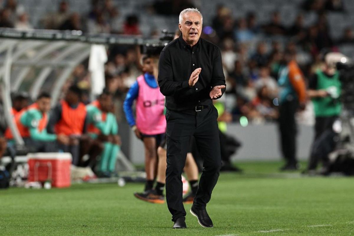 New Zealand's coach Darren Bazeley reacts during the FIFA World Cup 2026 Oceania qualifiers group final football match between New Zealand and New Caledonia at Eden Park Stadium in Auckland on March 24, 2025. DAVID ROWLAND / AFP