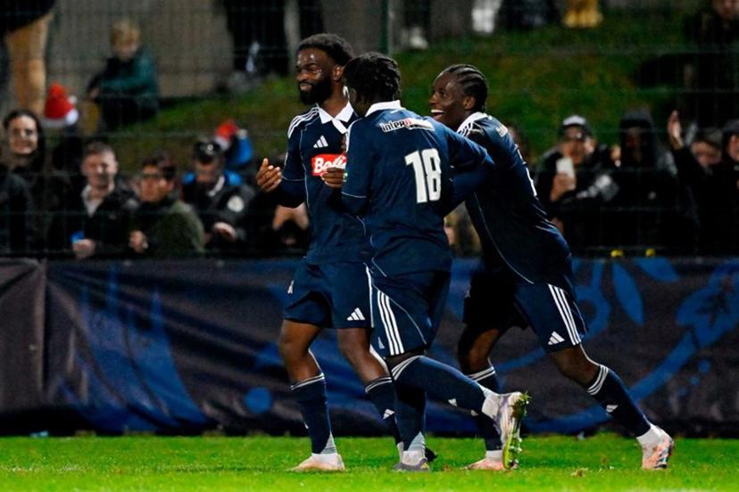 Paris FC's French forward #07 Jonathan Ikone celebrates scoring a penalty during the French Cup the French Cup round of 64 football match between Raon l'Etape and Paris FC at the Paul-Gasser Stadium, in Raon-l'Etape, eastern France, on December 20, 2025. Jean-Christophe VERHAEGEN / AFP