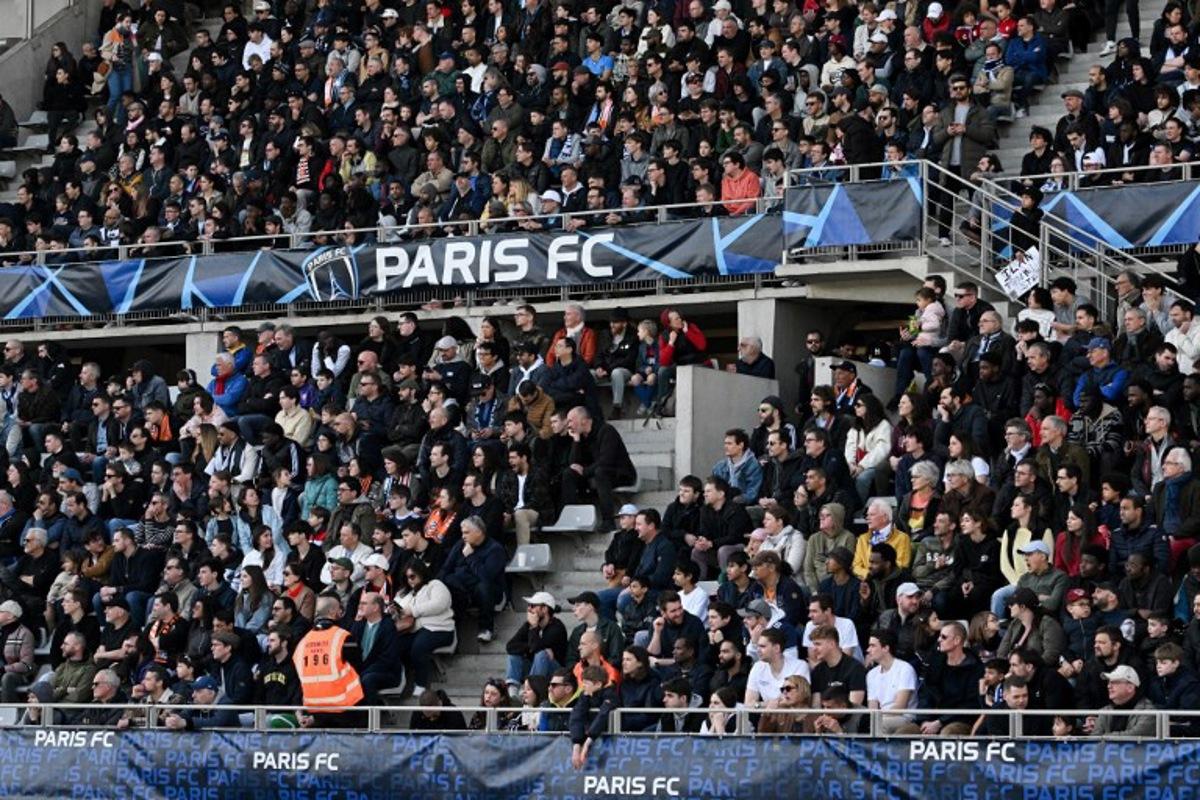 Paris FC's supporters attend the Ligue 2 football match between Paris FC and Lorient at the Charlety Stadium in Paris on March 8, 2025. Anna KURTH / AFP
