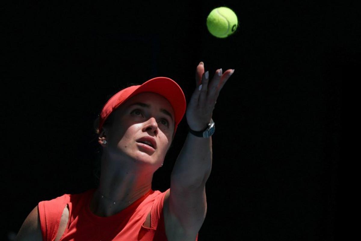 Ukraine's Elina Svitolina serves against USA's Madison Keys during their women's singles quarter-final match on day eleven of the Australian Open tennis tournament in Melbourne on January 22, 2025. Adrian DENNIS / AFP