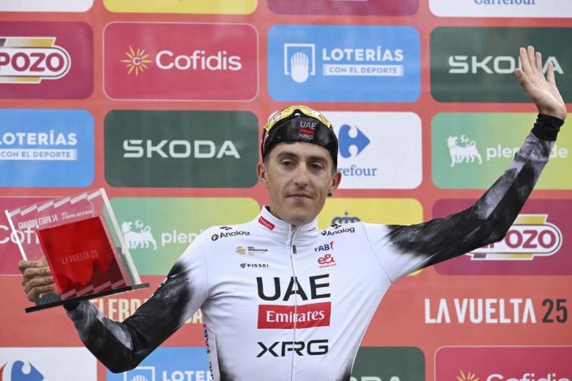 Team UAE's Spanish rider Marc Soler celebrates on the podium after winning the 14th stage of the Vuelta a Espana cycling tour, a 135 km race between Aviles and La Farrapona in Somiedo, on September 6, 2025. Miguel RIOPA / AFP