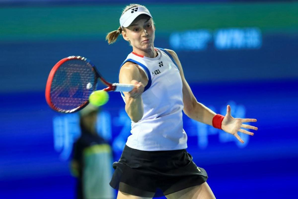 Kazakhstan's Elena Rybakina hits a return to Poland's Katarzyna Kawa during their women's singles quarter-final match at the Ningbo Open tennis tournament in Ningbo, China's eastern Zhejiang province on October 23, 2026. CN-STR / AFP