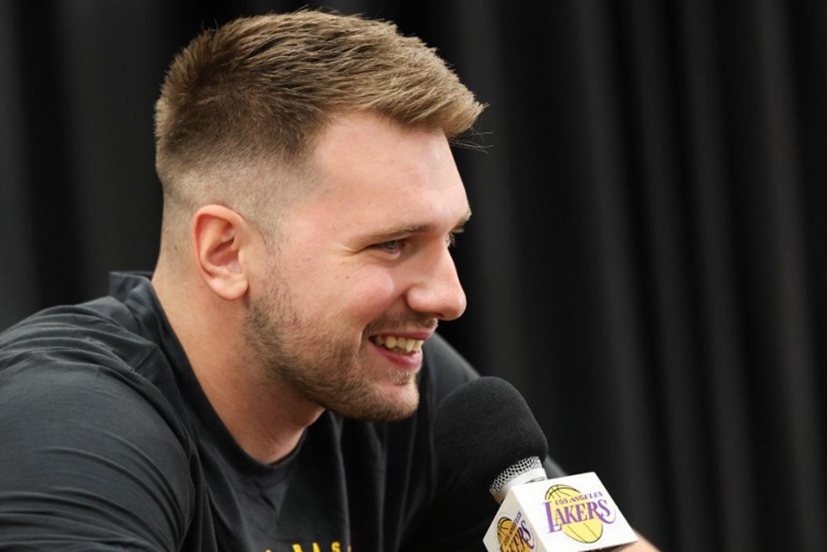 Slovenian professional basketball player Luka Doncic speaks to reporters during the Los Angeles Lakers media day at UCLA Health Training Center El Segundo, California on September 29, 2025. Patrick T. Fallon / AFP