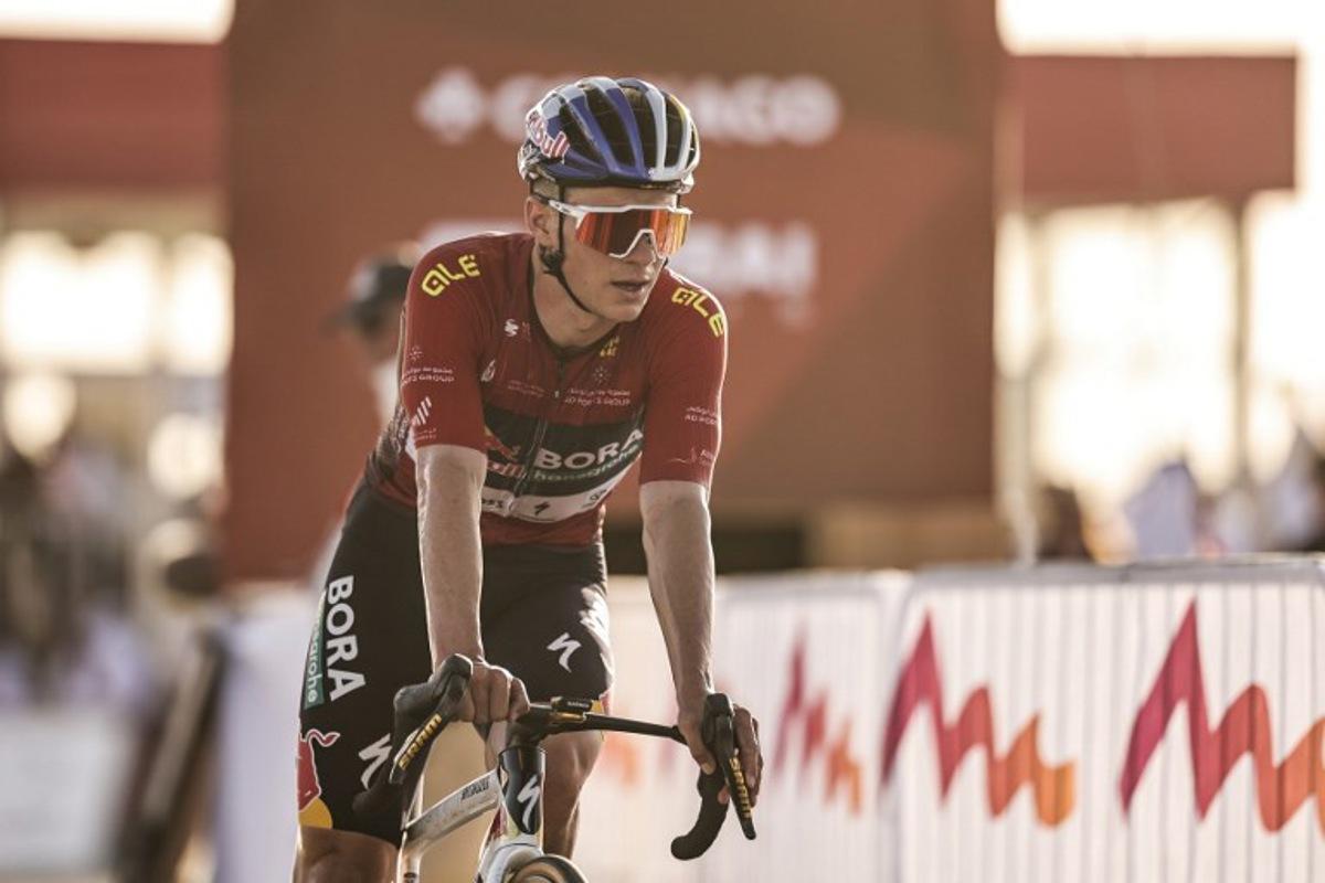 Red Bull-Bora-Hansgrohe's Belgian rider Remco Evenepoel crosses the finish line during the third stage of the UAE Tour cycling event from Umm al-Quwain to Jebel Mobrah in Ras al-Khaimah on February 18, 2026. Fadel SENNA / AFP