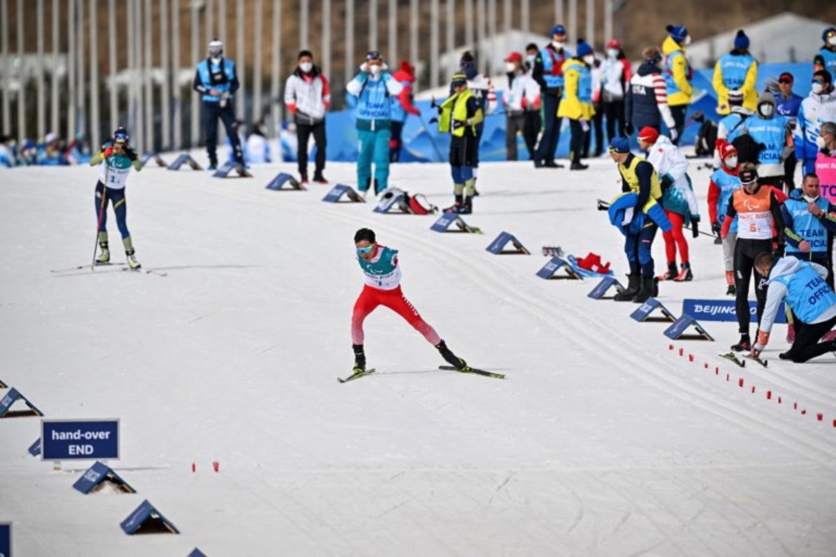 China's Wang Chenyang competes during the mixed relay para cross-country skiing event on March 13, 2022, at the Zhangjiakou National Biathlon Centre during the Beijing 2022 Winter Paralympic Games. Lillian SUWANRUMPHA / AFP
