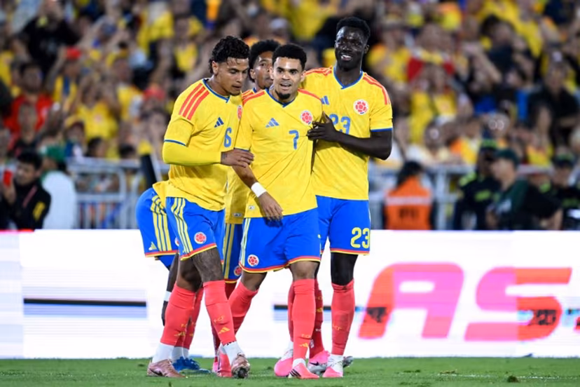 Colombia's forward #07 Luis Diaz celebrates with teammates midfielder #06 Richard Rios and defender #23 Davinson Sanchez after scoring their team's second goal during the international friendly football match between Colombia and Costa Rica at the Nemesio Camacho El Campin stadium in Bogota on June 1, 2026. Raul ARBOLEDA / AFP