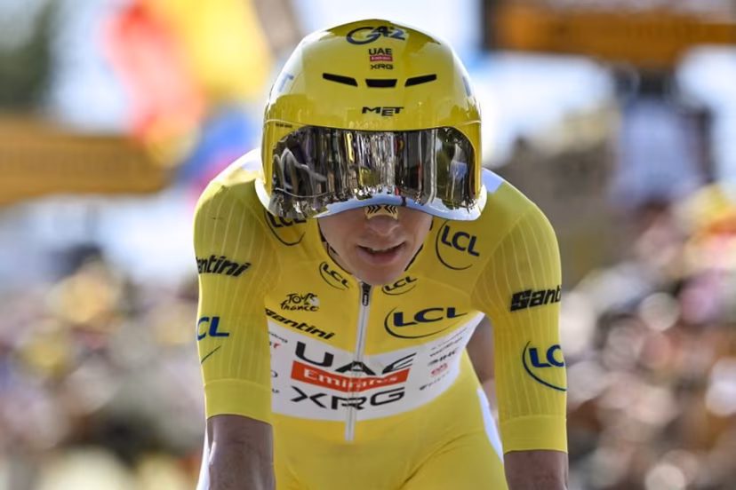 UAE Team Emirates - XRG's Slovenian rider Tadej Pogacar wearing the overall leader's yellow jersey cycles past the Lac Leman during the 16th stage of the 113th edition of the Tour de France cycling race, 26,1 km time trial between Évian-les-Bains and Thonon-les-Bains in the French Alps, on July 21, 2026. Jeff PACHOUD / AFP