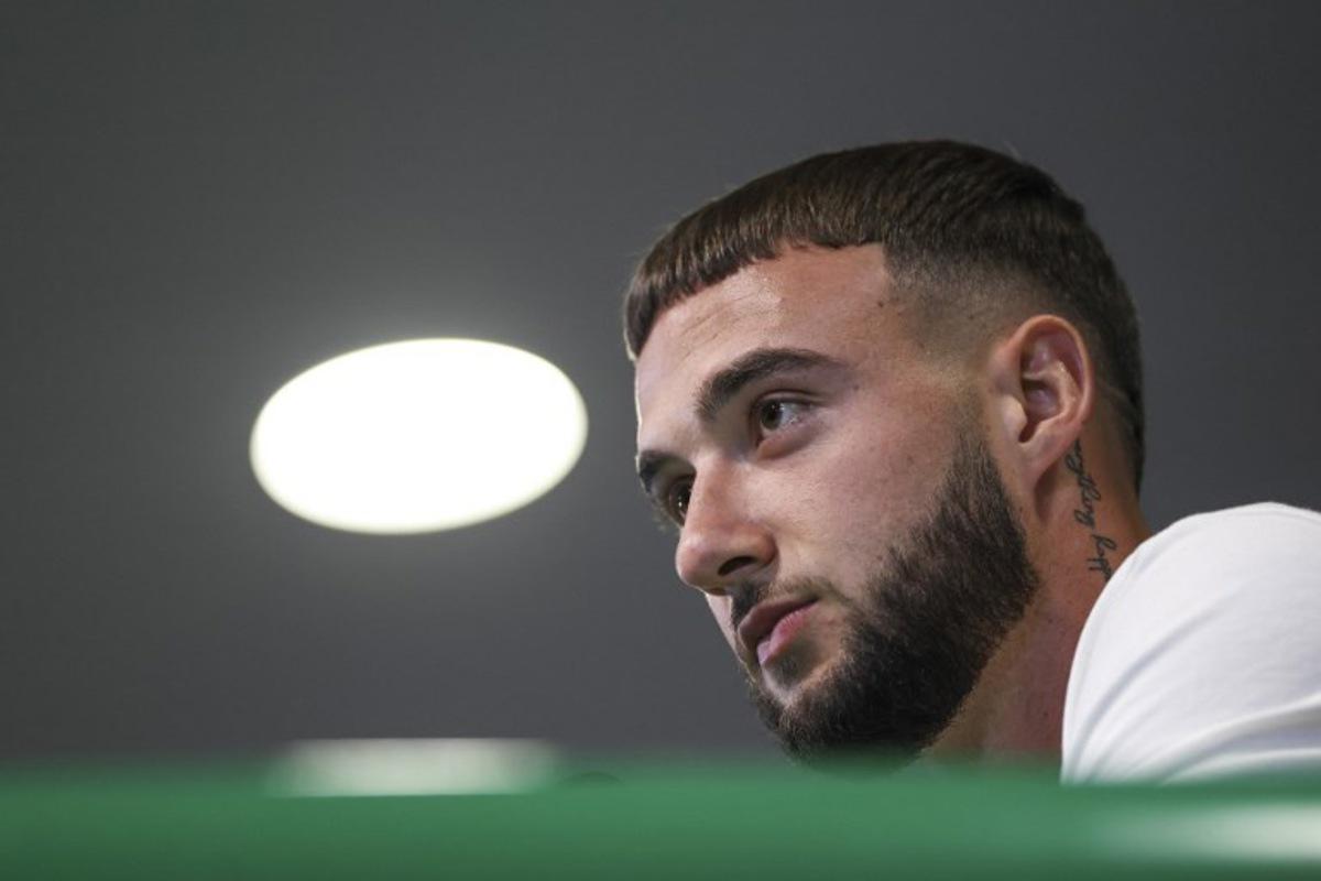 Sporting Lisbon's Belgian defender Zeno Debast speaks during a press conference on the eve of the UEFA Champions League first round day 1 football match between Sporting CP and Kairat Almaty at Alvalade stadium in Lisbon on September 17, 2025. PATRICIA DE MELO MOREIRA / AFP