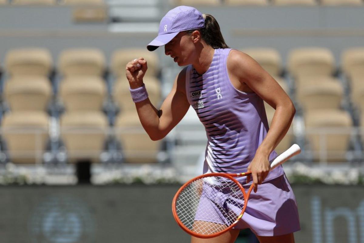 Poland's Iga Swiatek reacts to a point against Czech Republic's Sara Bejlek during their women's singles match on day 4 of the French Open tennis tournament on Court Philippe-Chatrier at the Roland-Garros Complex in Paris on May 27, 2026. Thomas SAMSON / AFP