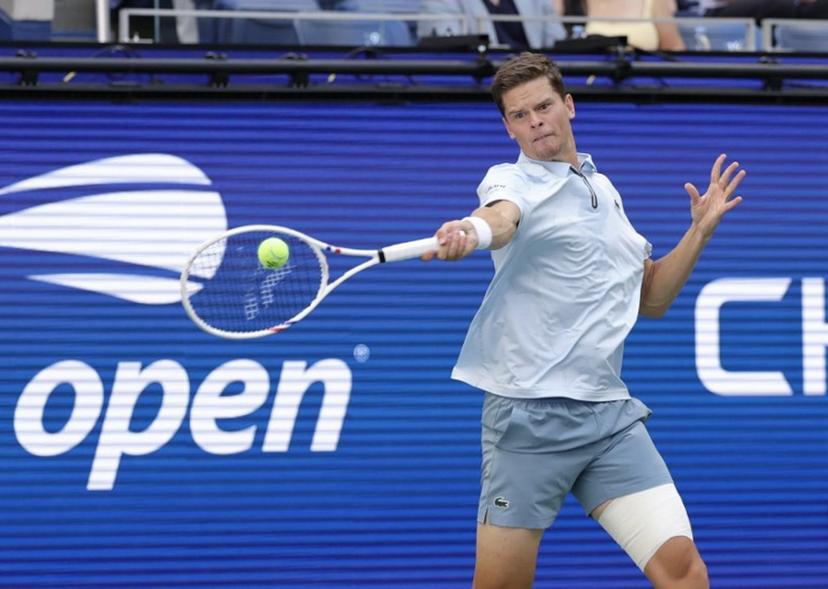 Belgium's Alexander Blockx plays a shot to Argentina's Francisco Cerundolo during their men's singles round of 16 tennis match on day nine of the US Open tennis tournament at the USTA Billie Jean King National Tennis Center in New York on September 7, 2026. KENA BETANCUR / AFP