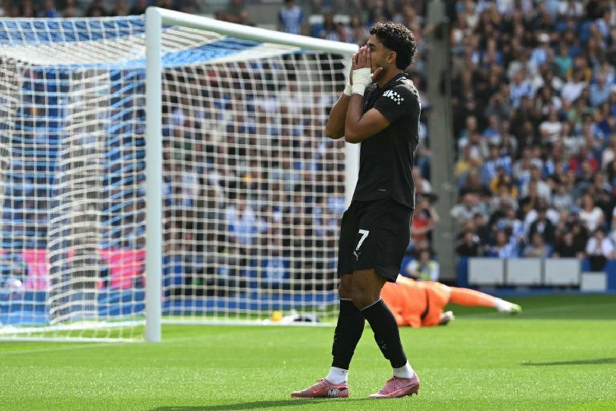Manchester City's Egyptian striker #07 Omar Marmoush reacts to a missed chance during the English Premier League football match between Brighton and Hove Albion and Manchester City at the American Express Community Stadium in Brighton, southern England on August 31, 2025. JUSTIN TALLIS / AFP