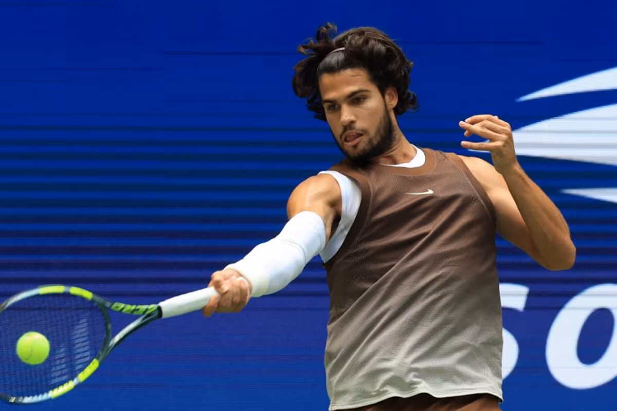 Spain's Carlos Alcaraz hits a return to China's Wu Yibing during their men's singles third round tennis match on day six of the US Open tennis tournament at the USTA Billie Jean King National Tennis Center in New York City on September 4, 2026. TIMOTHY A. CLARY / AFP