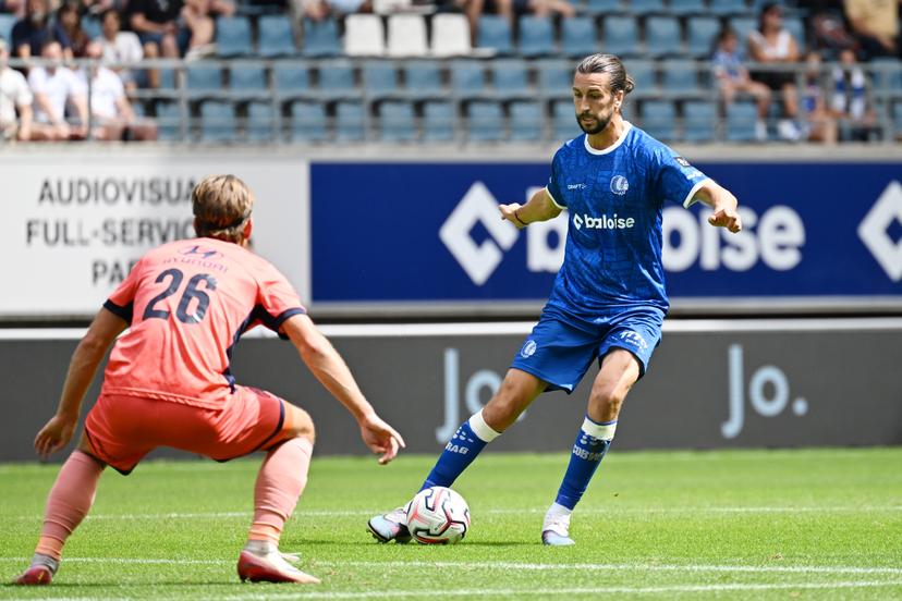 Mechelen's Dennis Praet and Gent's Christian Burgess fight for the ball during a soccer match between KAA Gent and KV Mechelen, Sunday 09 August 2026 in Gent, on day 1 of the 2026-2027 'Jupiler Pro League' first division of the Belgian championship. BELGA PHOTO MAARTEN STRAETEMANS