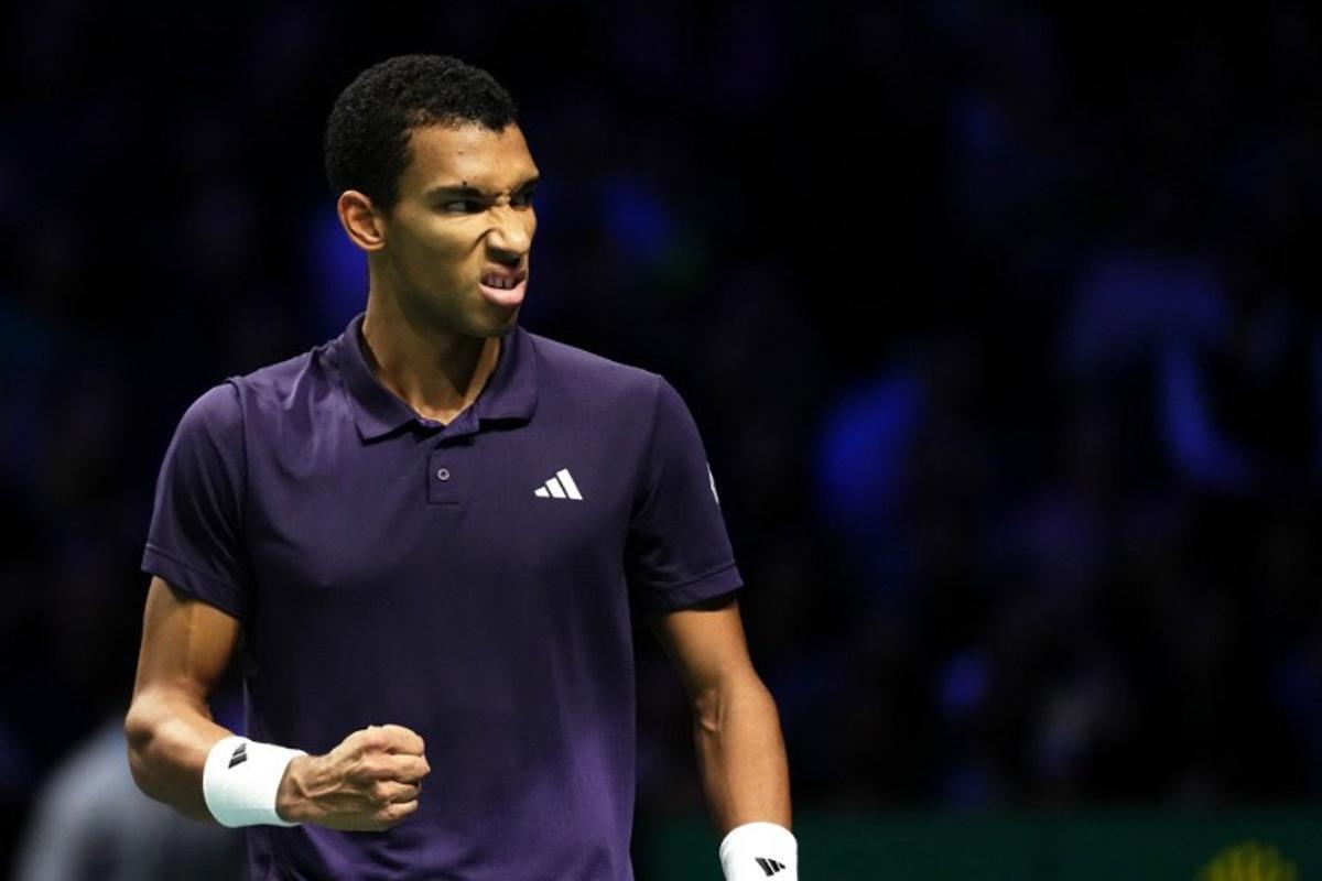 Canada's Felix Auger-Aliassime reacts after winning the first set as he plays against Kazakhstan's Alexander Bublik during their men's singles semi-final match on day six of the Paris ATP Masters 1000 tennis tournament at the Paris La Défense Arena in Nanterre, on the outskirts of Paris, on November 1, 2025. Dimitar DILKOFF / AFP