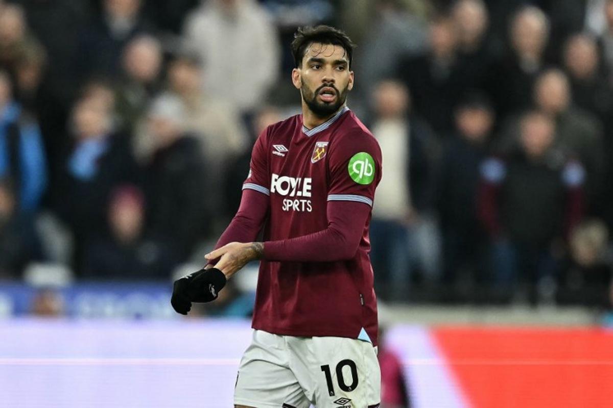 West Ham United's Brazilian midfielder #10 Lucas Paqueta leaves the game having been sent off during the English Premier League football match between West Ham United and Liverpool at the London Stadium, in London on November 30, 2025. Ben STANSALL / AFP