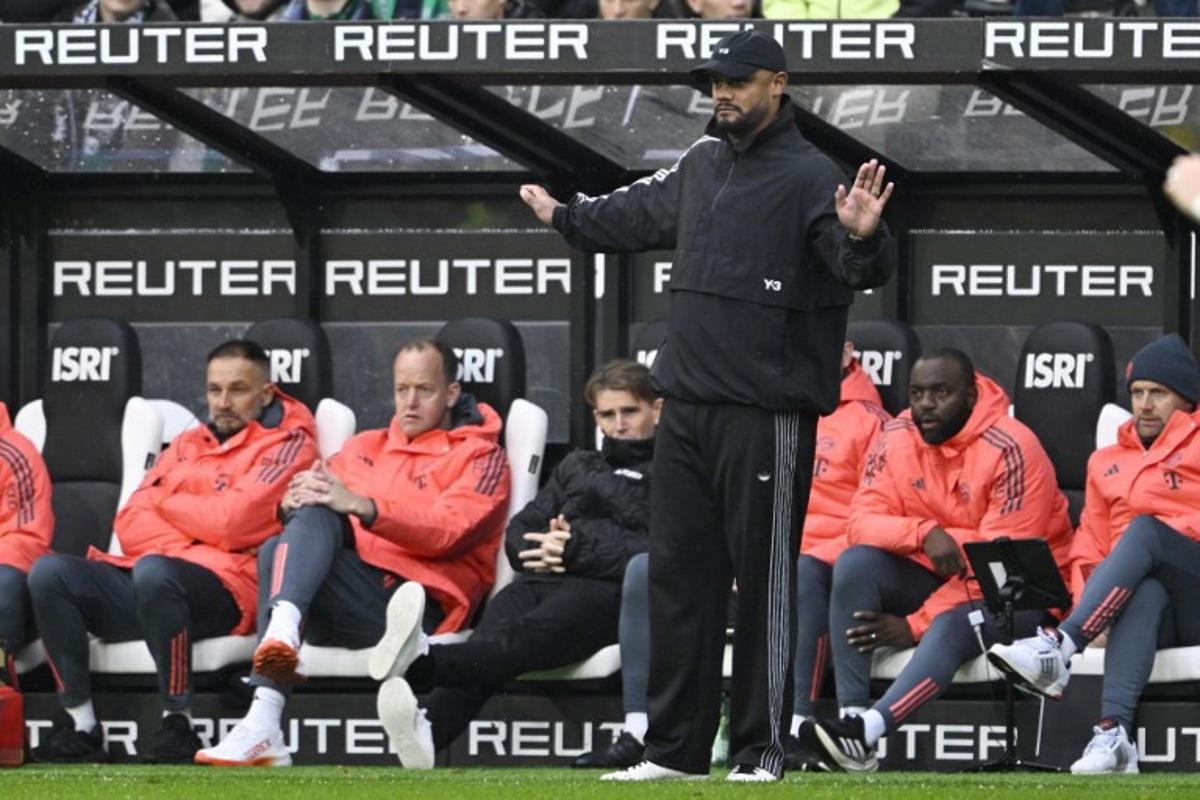 Bayern Munich's Belgian head coach Vincent Kompany gestures during the German first division Bundesliga football match between Borussia Moenchengladbach and FC Bayern Munich in Moenchengladbach, western Germany on October 25, 2025. INA FASSBENDER / AFP