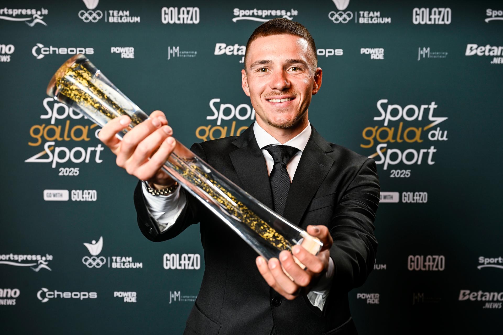 Belgian Remco Evenepoel poses for the photographer after winning the Sportman van het Jaar / Sportif de l Année 2025 the 'Sportgala' award show, to announce the sport women and men of the year 2025, Sunday 14 December 2025 in Schelle. BELGA PHOTO POOL NICO VEREECKEN