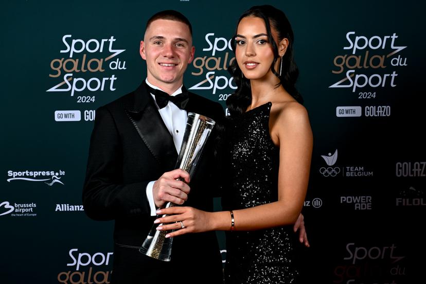 Belgian Remco Evenepoel of Soudal Quick-Step and his wife Oumi Rayane pose for the photographer during the 'Sportgala' award show, to announce the sport women and men of the year 2024, Sunday 12 January 2025 in Zaventem. BELGA PHOTO DIRK WAEM