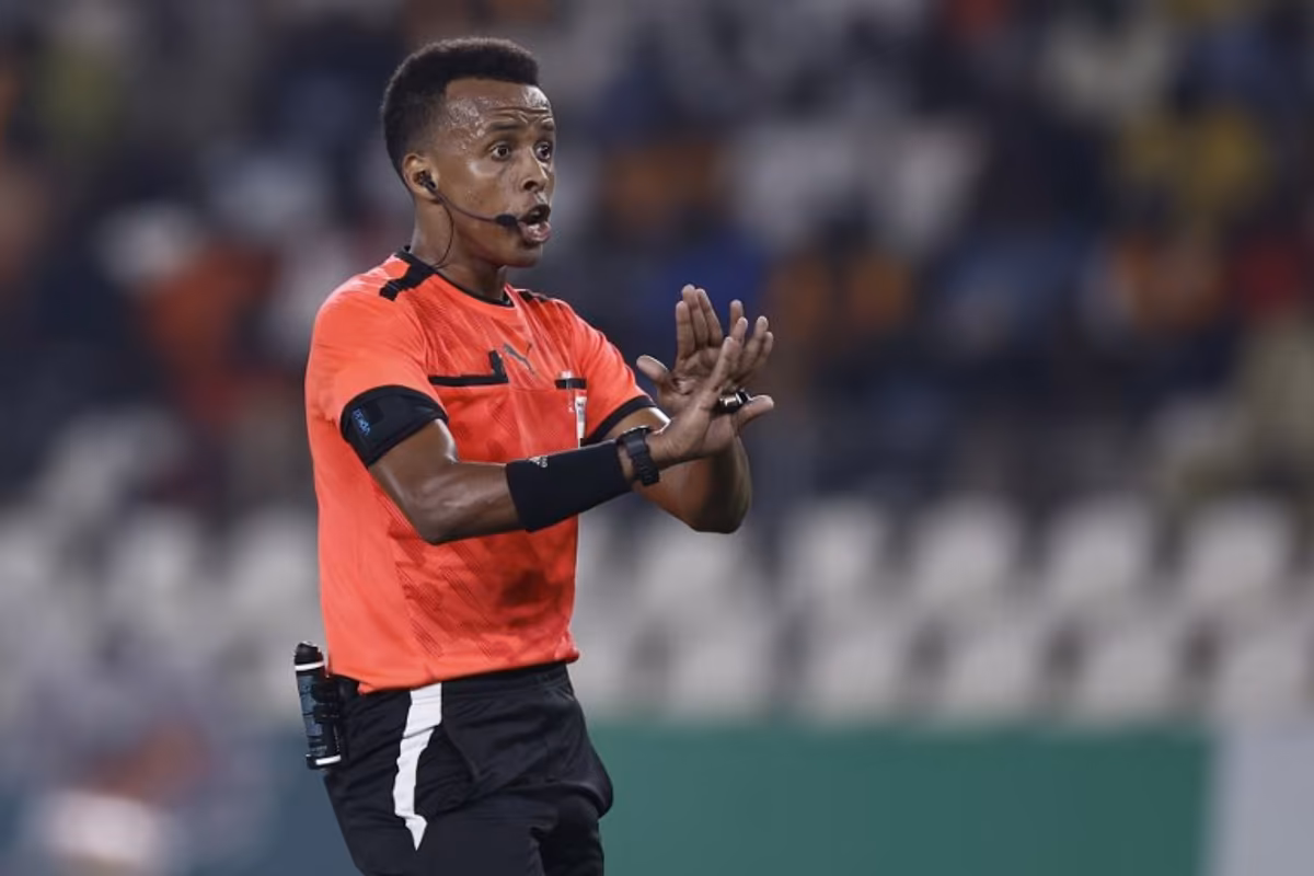 (FILES) Somalian referee Omar Abdulkadir Artan gestures during the Africa Cup of Nations (CAN) 2024 group D football match between Mauritania and Algeria at Stade de la Paix in Bouake on January 23, 2024. Award-winning Somali referee Omar Artan, set to be the first from his country to officiate at the World Cup, was denied entry to the United States, a sports ministry official told AFP on June 8, 2026. "Denying him entry to the United States and preventing him from officiating scheduled matches harms not only him personally but also undermines football's commitment to fairness, merit, and the spirit of fair play," Ciise Aden Abshir, a senior advisor to Somalia's Ministry of Youth and Sports and a former national team captain, told AFP. KENZO TRIBOUILLARD / AFP