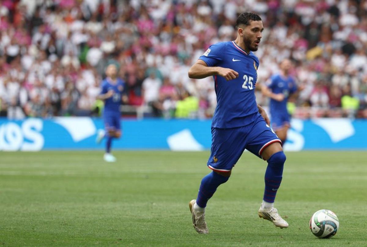 France's forward #25 Rayan Cherki plays the ball during the UEFA Nations League third place play-off football match between Germany and France in Stuttgart, southwestern Germany on June 8, 2025. FRANCK FIFE / AFP