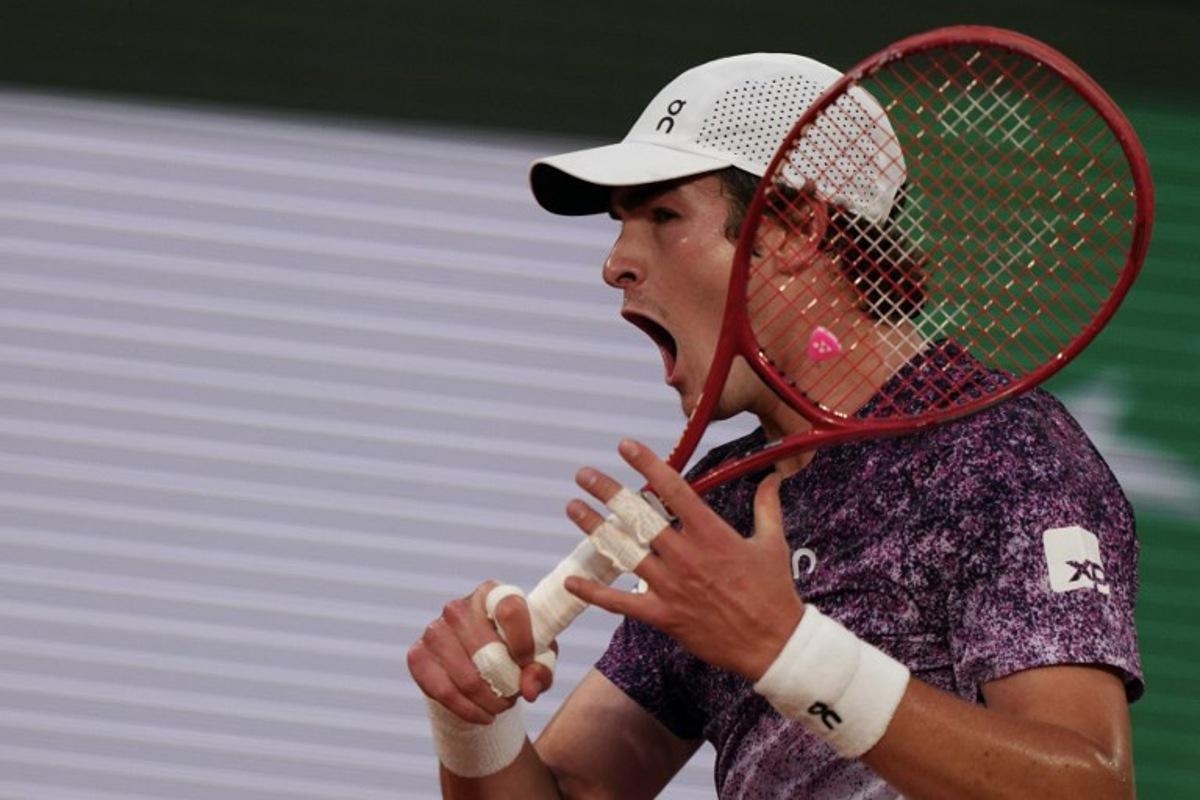 Brazil's Joao Fonseca reacts to a point against Norway's Casper Ruud during their men's singles match on day 8 of the French Open tennis tournament on Court Philippe-Chatrier at the Roland-Garros Complex in Paris on May 31, 2026. Dimitar DILKOFF / AFP