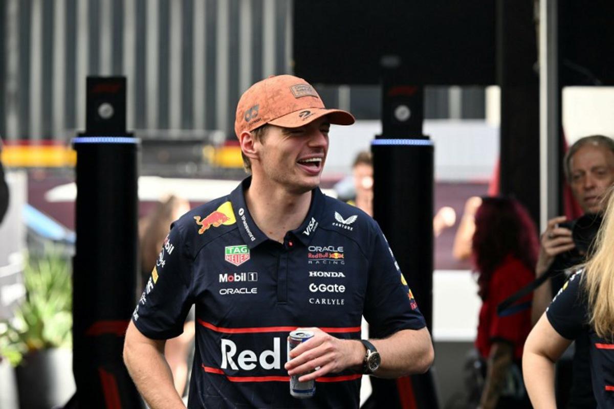 Red Bull Racing's Dutch driver Max Verstappen arrives in the paddock ahead of the United States Formula One Sprint at the Circuit of the Americas in Austin, Texas, on October 18, 2025. RONALDO SCHEMIDT / AFP