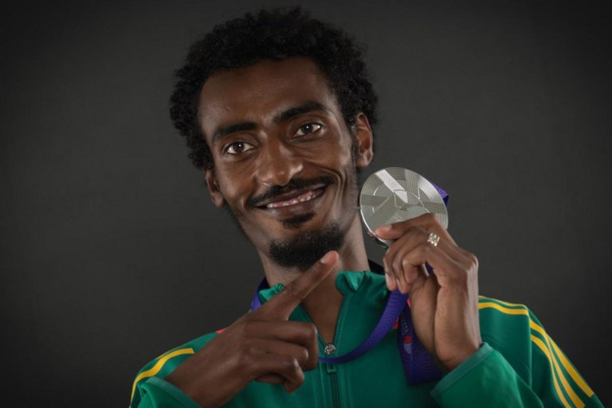 Silver medallist of the men's 10000m final Ethiopia's Yomif Kejelcha poses for portraits during a studio photo session on the sidelines of the World Athletics Championships in Tokyo on September 15, 2025. Andrej ISAKOVIC / AFP