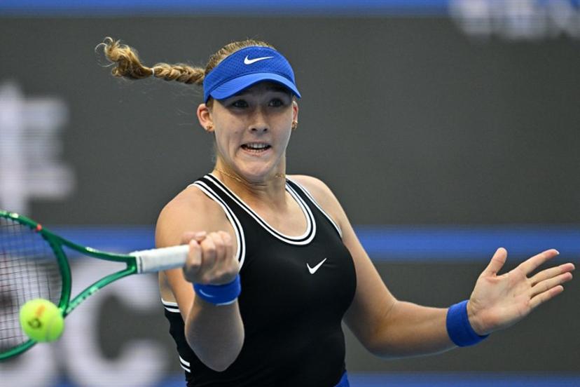 Russia's Mirra Andreeva hits a return to Czech Republic's Nikola Bartunkova during their women's singles semi-final at the China Open tennis tournament in Beijing on October 10, 2026. Pedro Pardo / AFP