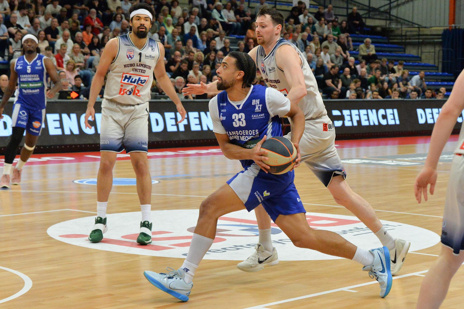 Mechelen's Trenton Gibson and Limburg's Jonas Delalieux pictured in action during a basketball match between Limburg United and Kangoeroes Mechelen, Thursday 22 May 2025 in Hasselt, the second leg of the best-of-5 semi-finals in the playoffs of the 'BNXT League' Belgian/ Dutch first division basket championship. BELGA PHOTO JILL DELSAUX