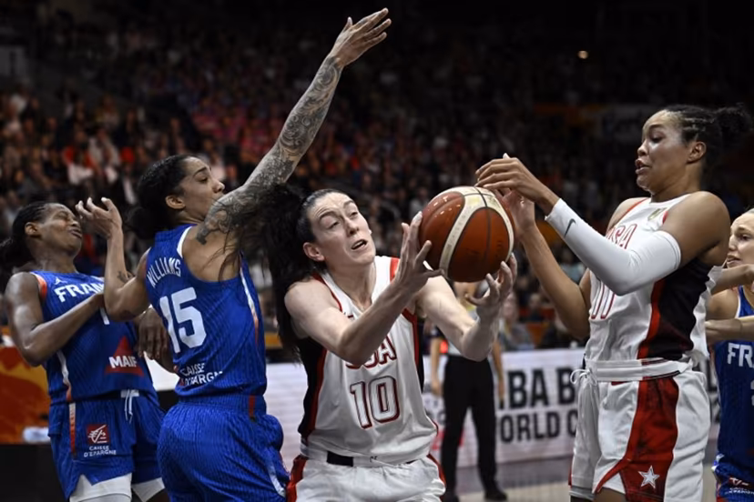 France's forward #15 Gabby Williams and USA's power forward #10 Breanna Stewart vie for the ball during the 2026 FIBA Women's Basketball World Cup final game between the United States and France in Berlin on September 13, 2026. Tobias SCHWARZ / AFP