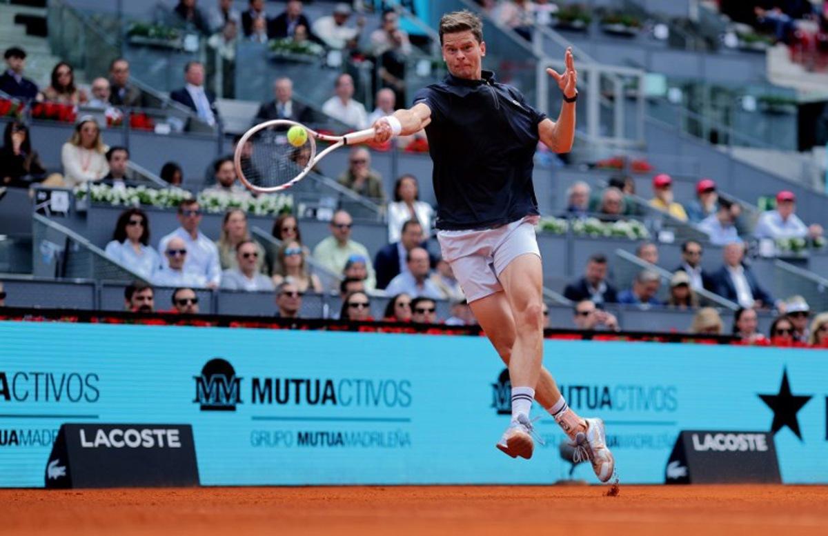 Belgium's Alexander Blockx returns the ball to Norway's Casper Ruud during their 2026 ATP Tour Madrid Open tennis tournament quarter-final singles match at the Caja Magica in Madrid, on April 30, 2026. Thomas COEX / AFP