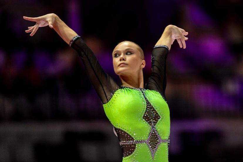 First-placed Individual Neutral Athlete (AIN) Angelina Melnikova competes on the floor exercise for the women's all-around final at the 53rd FIG Artistic Gymnastics World Championships in Jakarta on October 23, 2025. Yasuyoshi CHIBA / AFP