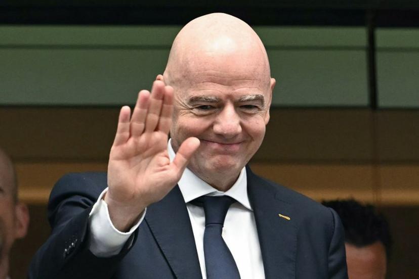 FIFA President Gianni Infantino gestures from the stands ahead of the 2026 World Cup football tournament semi-final match between France and Spain at the Dallas Stadium in Arlington on July 14, 2026. RONALDO SCHEMIDT / AFP