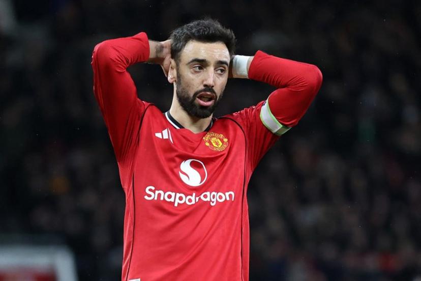 Manchester United's Portuguese midfielder #08 Bruno Fernandes reacts to a missed chance during the English Premier League football match between Manchester United and Everton at Old Trafford in Manchester, north west England, on November 24, 2025. Darren Staples / AFP