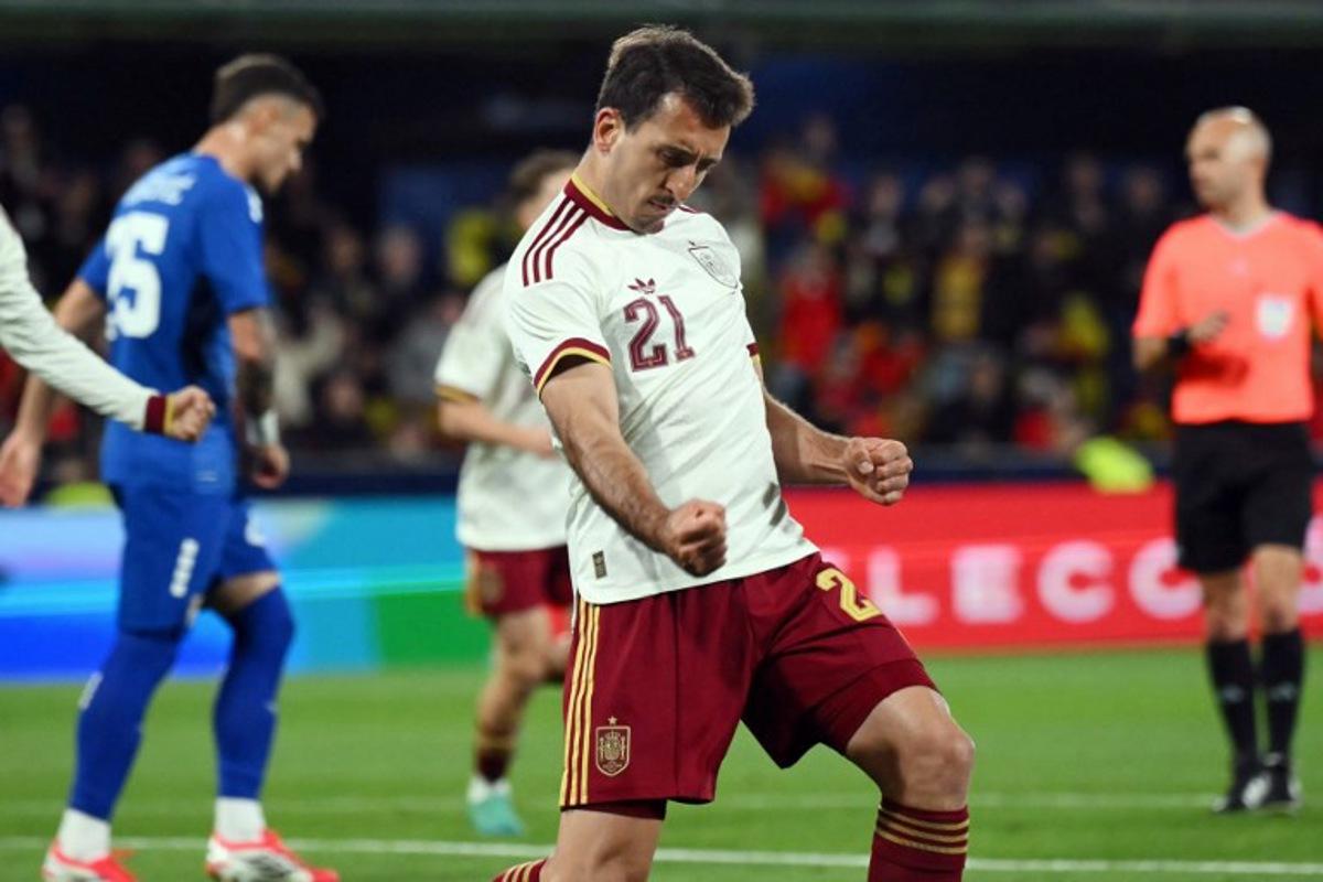 Spain's midfielder #21 Mikel Oyarzabal celebrates scoring the opening goal during the international friendly football match between Spain and Serbia at La Ceramica Stadium in Vila-real on March 27, 2026. JOSE JORDAN / AFP