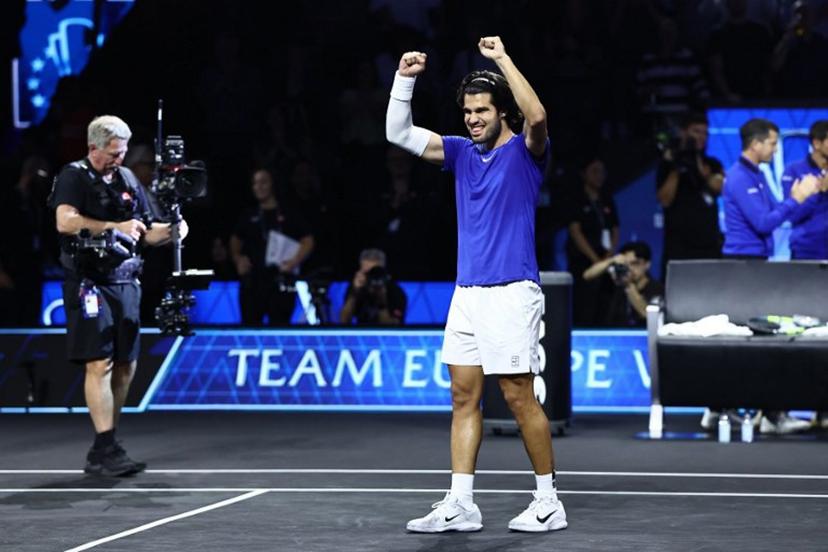 Spain's Carlos Alcaraz of Team Europe celebrates victory against USA's Taylor Fritz of Team World during their 2026 Laver Cup men's singles tennis match, at the O2 Arena in London on September 26, 2026. Henry Nicholls / AFP