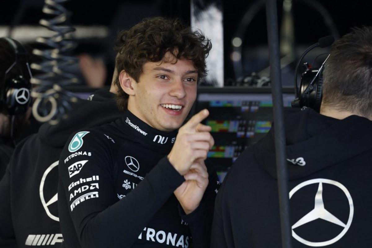 Mercedes' Italian driver Kimi Antonelli gestures in the pits before the start of the qualifying session ahead of the Formula One Japanese Grand Prix at the Suzuka circuit in Suzuka, Mie prefecture on March 28, 2026. FRANCK ROBICHON / POOL / AFP